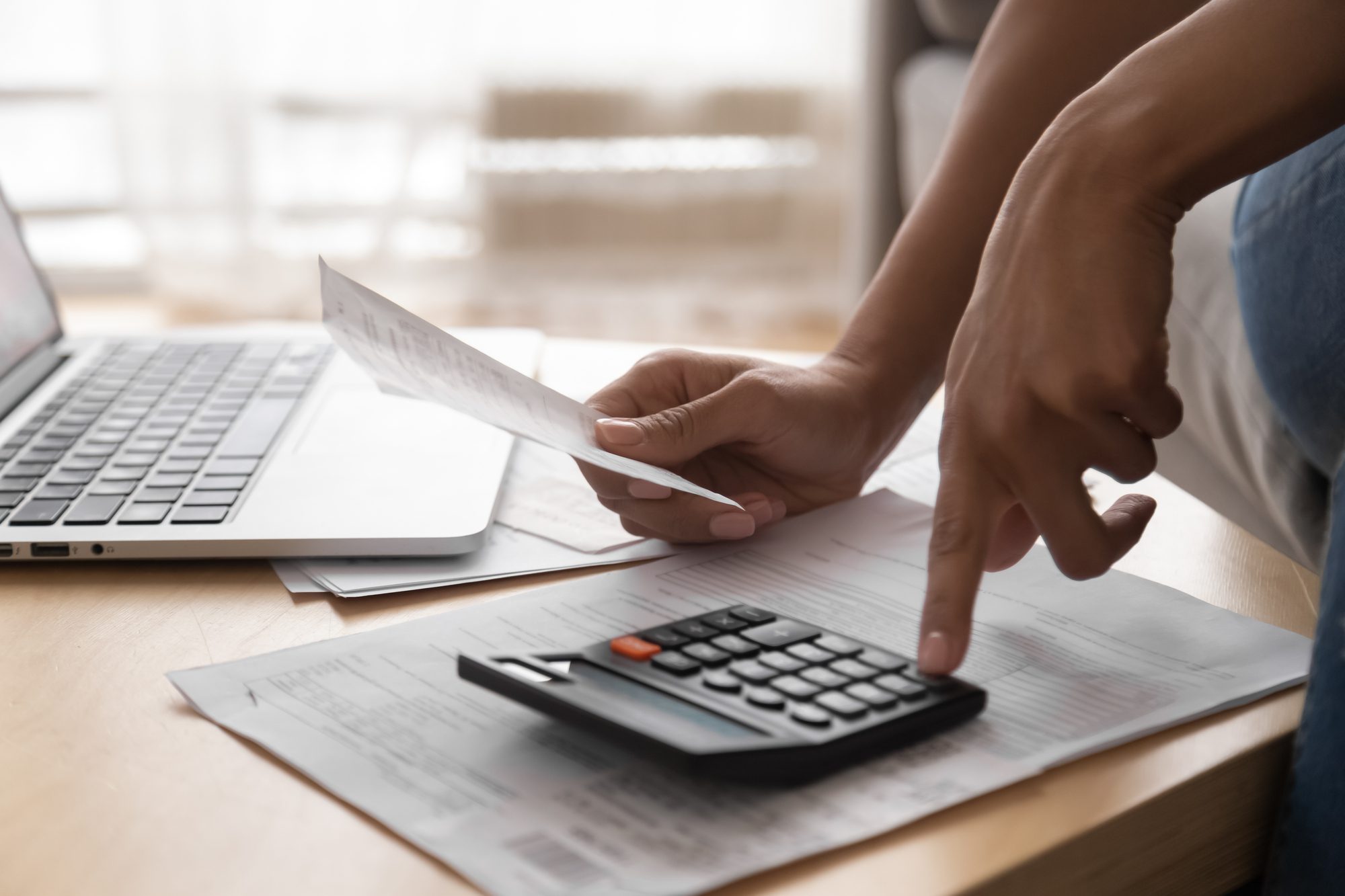 Person Using A Calculator
